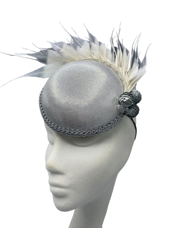 Stunning silver headpiece with cream into ombre silver spray of feathers.